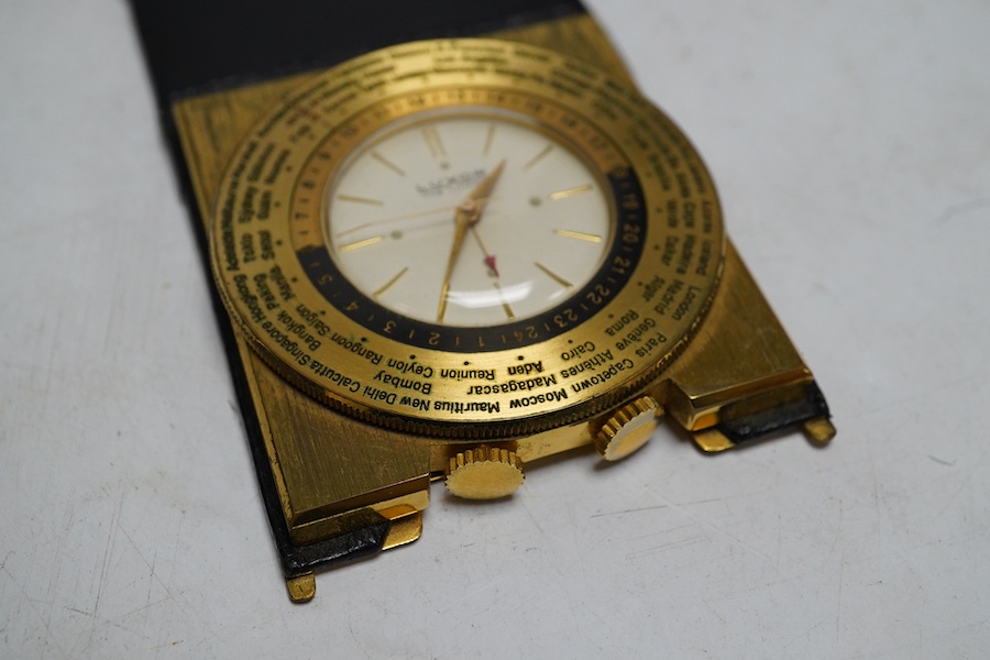 A vintage Luxor Swiss gold plated world time quartz travel alarm clock, in black leather case. Condition - fair to good